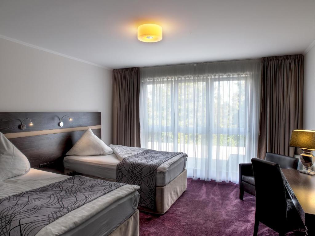 Sporthotel Racket Inn ハンブルク 部屋 写真